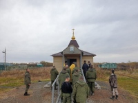 На общевойсковом полигоне было совершено таинство Крещения над 20-ю мобилизованными воинами